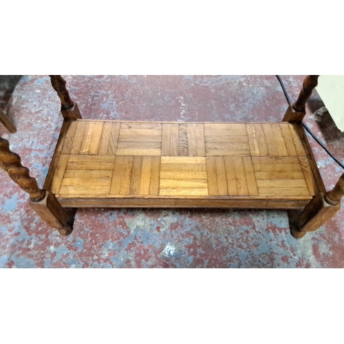 533 - Vintage oak console table with intricate parquet design and turned legs. Includes a lower shelf.