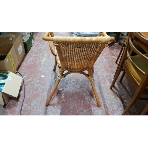 534 - Vintage wicker and bamboo armchair, featuring a classic woven design.