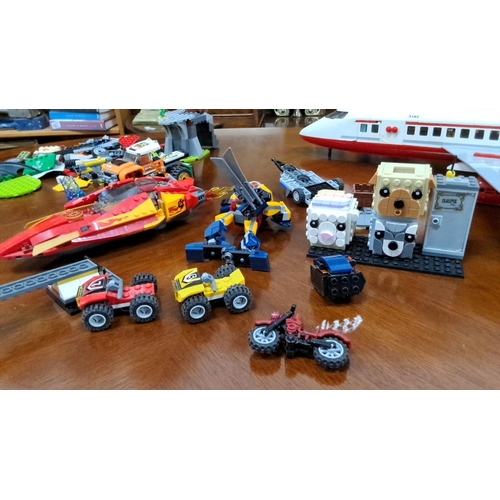 549 - Mixed lot of LEGO including airplane, vehicles, and various creative builds. Includes a large airpla... 