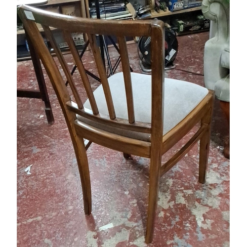 550 - Mid-Century wooden dining chair with a slatted back design and upholstered seat, from oak.