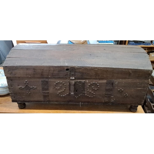 556 - Antique wooden chest with iron hardware and decorative motifs, from the 19th century. Made from rust... 