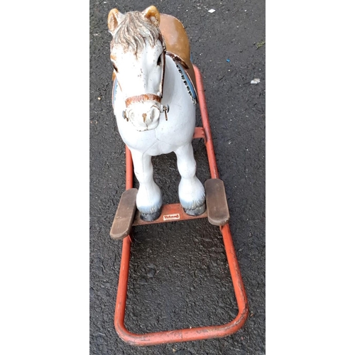 557 - Vintage Tri-ang rocking horse, painted metal with brown saddle and blue detailing, on a sturdy red m... 