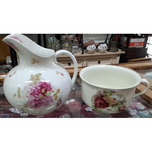 559 - Rubian Art Pottery, England. Victorian-style porcelain wash jug and basin, floral motif.