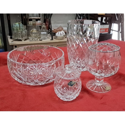 560 - Set of four pieces of Royal Brierley English lead crystal pieces, featuring intricate designs. Inclu... 