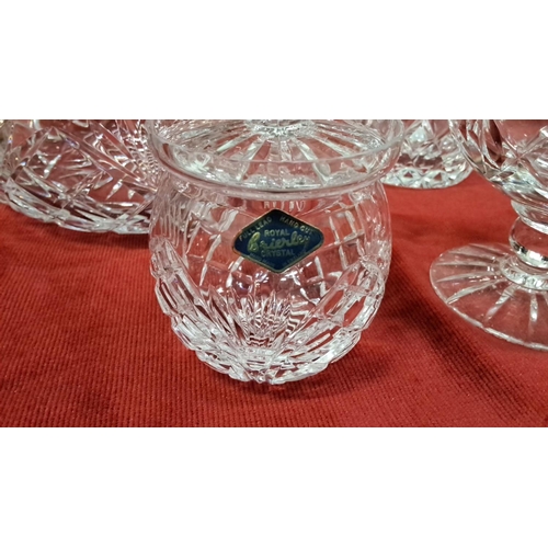 560 - Set of four pieces of Royal Brierley English lead crystal pieces, featuring intricate designs. Inclu... 