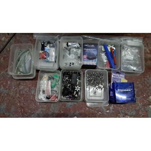 570 - Box of assorted electronic components and accessories, including cables, connectors, and fixings. Co... 