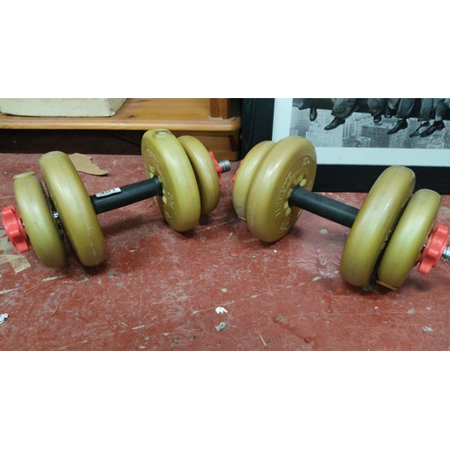 401 - York adjustable dumbbells, 5 lb each, featuring durable weight plates and secure screw locks.