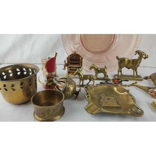 409 - Assorted vintage brass miniatures including a sewing machine, animals, and decorative objects. Inclu... 