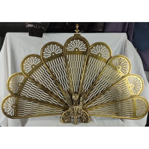 417 - Vintage Brass fireplace screen, features a peacock and filigree design.  Measuring 45cm in height.