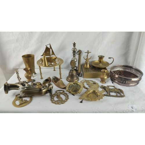 426 - Collection of vintage brass and metal items including candlesticks, vases, a scale, and decorative p... 