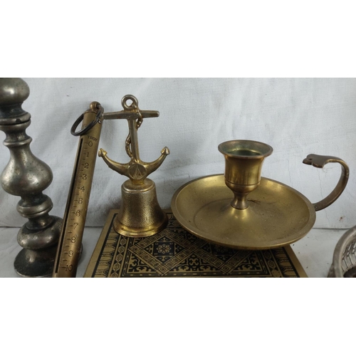 426 - Collection of vintage brass and metal items including candlesticks, vases, a scale, and decorative p... 