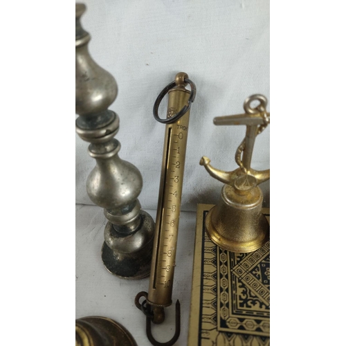 426 - Collection of vintage brass and metal items including candlesticks, vases, a scale, and decorative p... 