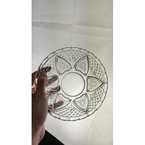 433 - Pressed glass lidded bowl with intricate floral and geometric patterns and a clear crystal finish.