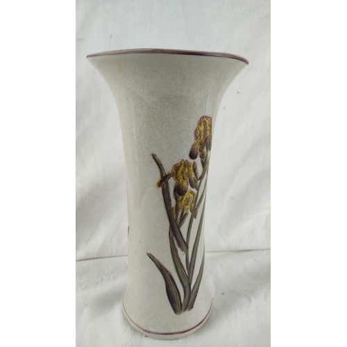 434 - Ceramic vase with iris motif, glazed finish, featuring a crown hallmark on the base. From the early ... 