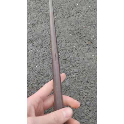 440 - An antique rosewood javelin, measuring approx 210cm