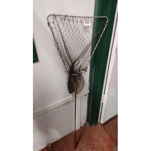 444 - Vintage metal fishing net with wooden handle. Sturdy netting and robust construction.