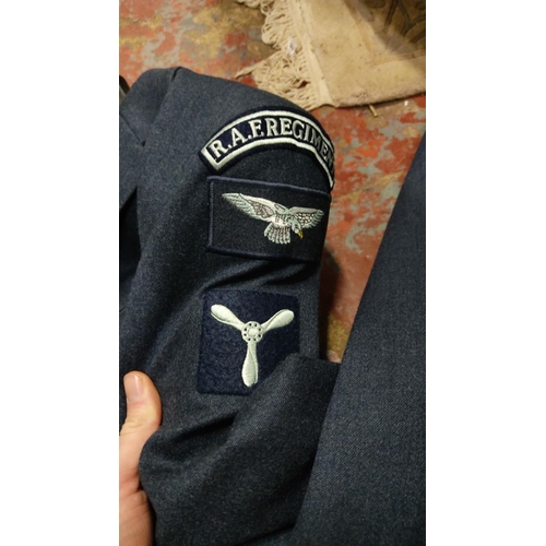 450 - 2 Royal Air Force uniform jackets, featuring brass buttons with crown and eagle insignia. Dark blue ... 