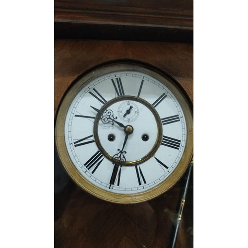 454 - An antique double weight Vienna clock.