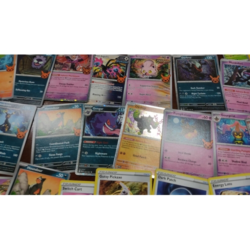 473 - Collection of assorted Pokémon trading cards featuring various characters and styles, including holo... 