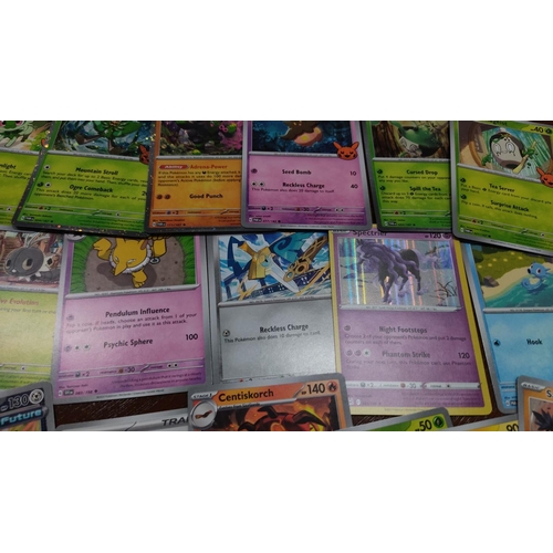 473 - Collection of assorted Pokémon trading cards featuring various characters and styles, including holo... 