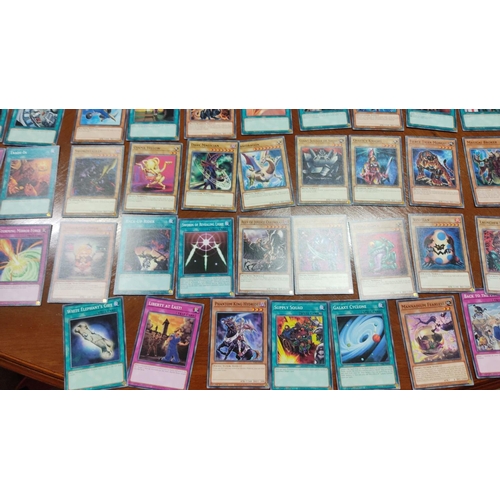 475 - Collection of Yu-Gi-Oh! trading cards, featuring Castel, the Skyblaster Musketeer and Daigusto Emera... 