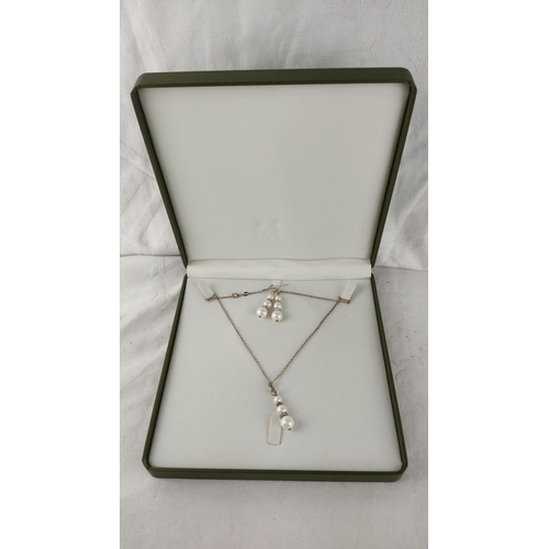 481 - Pearl necklace and earring set with silver chain and crystal accents, displayed in a presentation bo... 