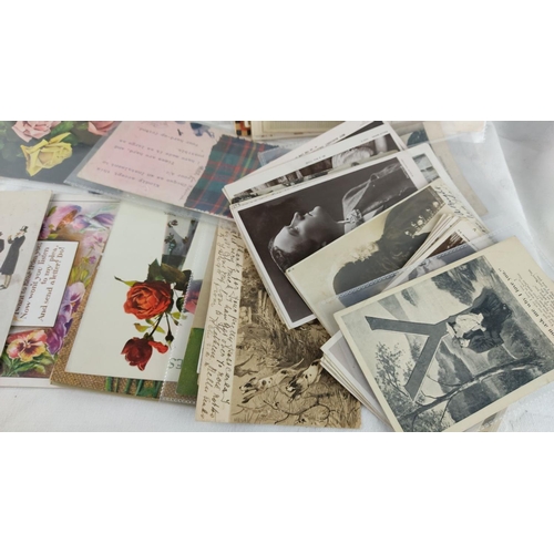 487 - Collection of vintage postcards featuring floral, maritime, and Victorian themes. Includes both colo... 