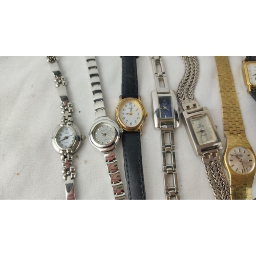 488 - Collection of assorted wristwatches including quartz models. Various brands and styles include Genev... 