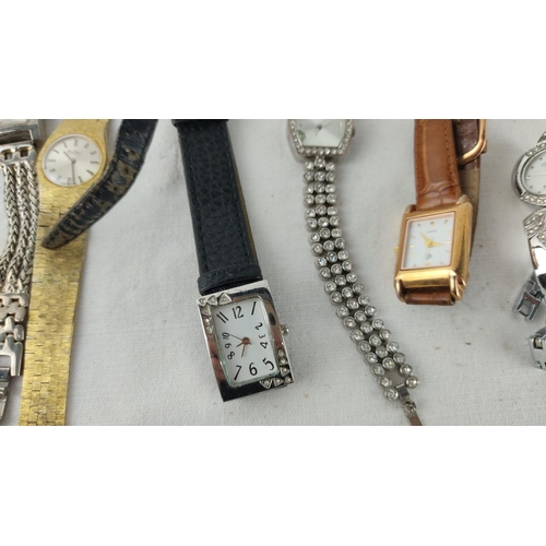 488 - Collection of assorted wristwatches including quartz models. Various brands and styles include Genev... 