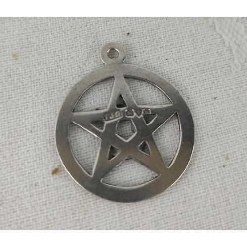 494 - Sterling silver Masonic pendant features a star design with 