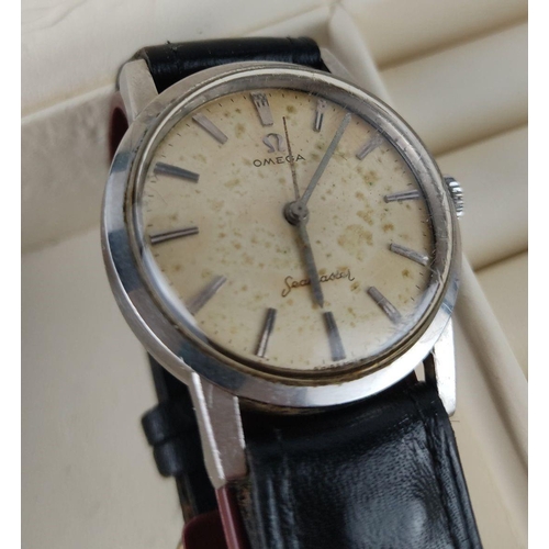 497 - Omega Seamaster wristwatch, vintage model. Stainless steel case, leather strap, automatic movement. ... 