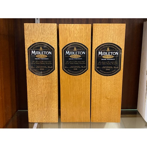 468 - Three wooden presentation boxes for Midleton Irish Whiskey dated 1998, 2000, 2006.