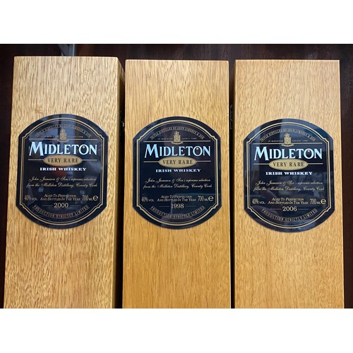 468 - Three wooden presentation boxes for Midleton Irish Whiskey dated 1998, 2000, 2006.