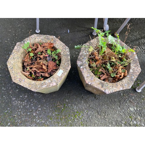 467 - A pair of concrete planters.