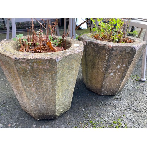 467 - A pair of concrete planters.