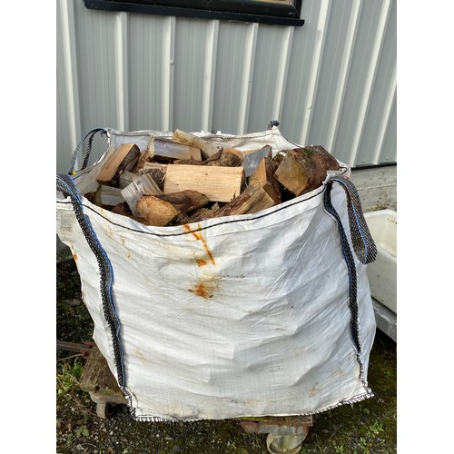 170 - A large sack of firewood blocks.