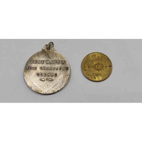 124 - Rémy Martin Fine Champagne Cognac medal and 1932 Dublin Eucharistic Congress souvenir medal.