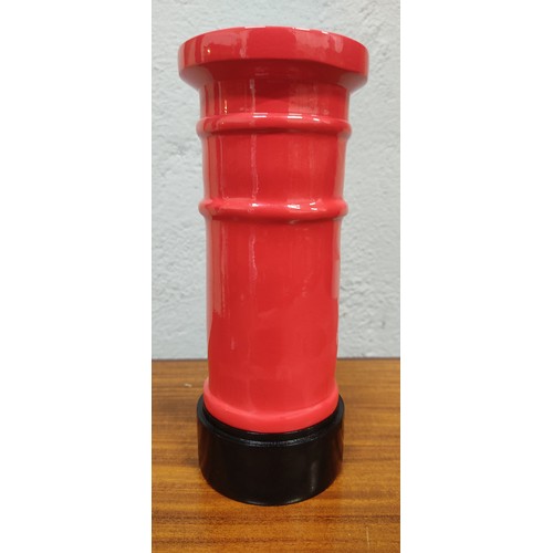 311 - A novelty Royal Mail metal money box. Measuring approx 20cm tall