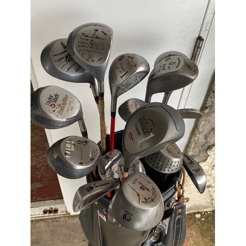 188 - A set of golf clubs.