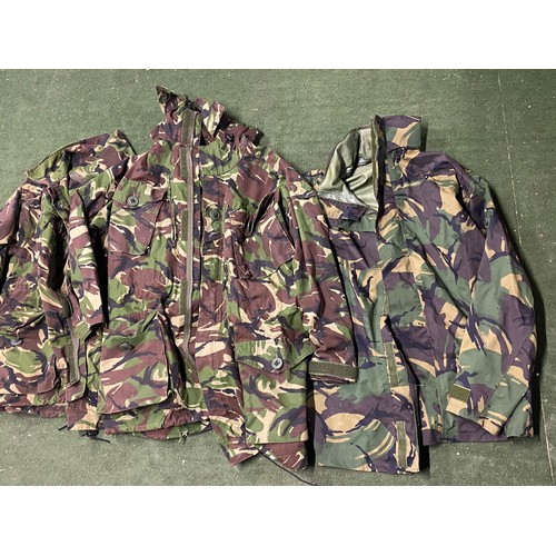 255 - Three army camouflage jackets.