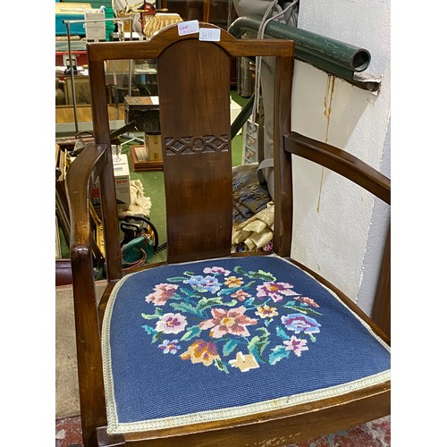 411 - An antique mahogany chair with tapestry seat.