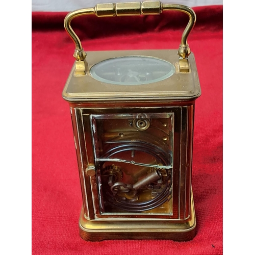 50 - An antique brass cased French carriage clock.