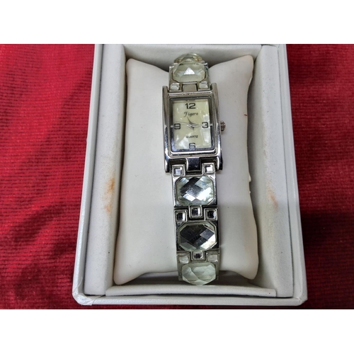 54 - A ladies Figaro wristwatch in original box.