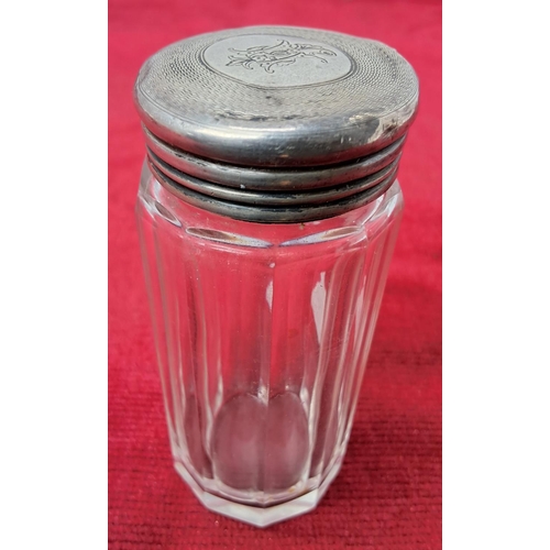 59 - An antique bottle with Sterling Silver topper.