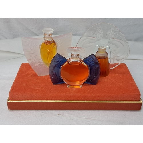 66 - A stunning Lalique 'Les Introuvables/ Ultimate Collection' pure perfume set, in original card displa... 