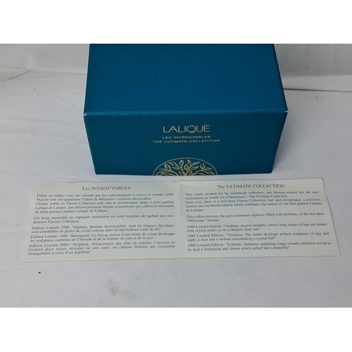 66 - A stunning Lalique 'Les Introuvables/ Ultimate Collection' pure perfume set, in original card displa... 