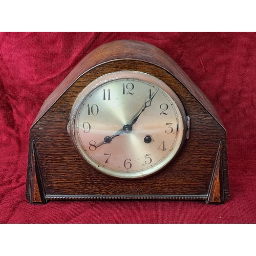 89 - A vintage oak cased clock.