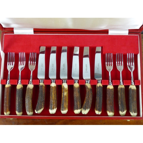 11 - A canteen of antler handled cutlery produced by Cooper Bros and Sons Silversmiths and Cutlers, Sheff... 