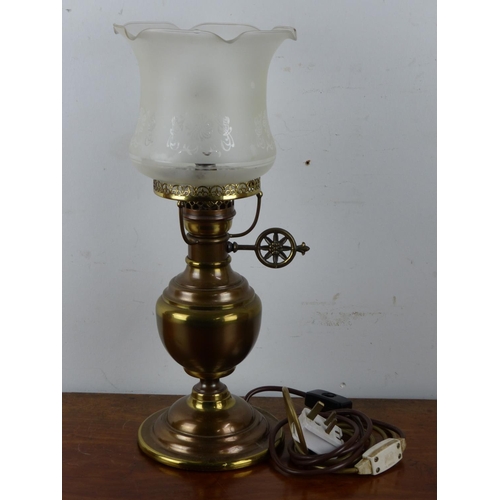 14 - A vintage brass oil lamp and shade converted to electric.