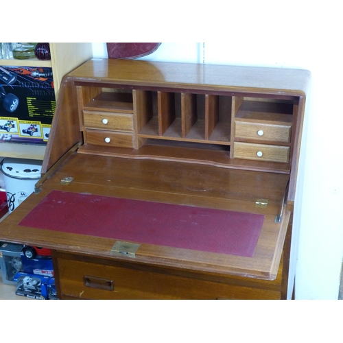 19 - A mid-century teak writing bureau with red leather writing board.